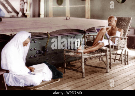 Mahatma Gandhi working on sundeck during his voyage to England, India, Asia, September 1931 Stock Photo