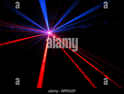 Blue and red laser beam light effects on black background Stock Photo