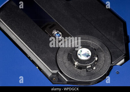 An open CD player showing laser and spindle assemblies Stock Photo