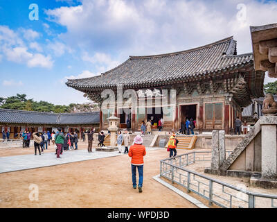 31 March 2019: Gyeong-Ju, South Korea - Visitors at the Bulguksa Buddhist Temple, Gyeong-Ju, a UNESCO World Heritage site. Stock Photo