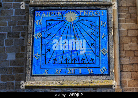 sun dial on wall of the Ely Cathedral and town centre cambridgeshire east anglia england uk gb Stock Photo
