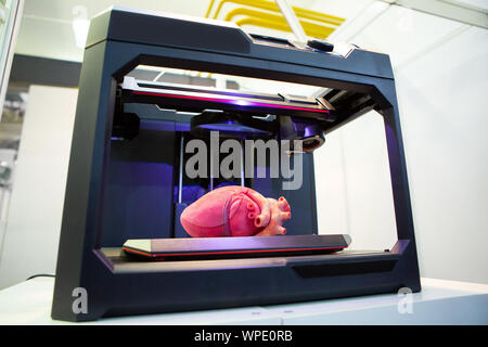 3d printer with a printed human heart Stock Photo