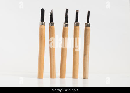 five gouges for wood carving on white isolated background Stock Photo