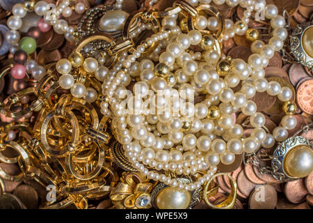 Gold, coins and jewelry as treasure in detail Stock Photo