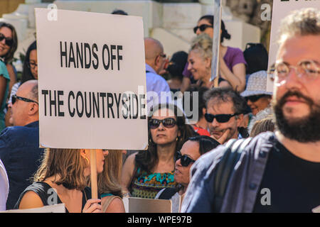 Enough is enough. A demonstration against environmental destruction in Malta. Protesting at out of control construction, road building. Stock Photo