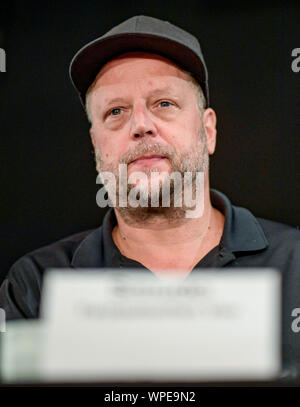 Hamburg, Germany. 09th Sep, 2019. Smudo, musician, follows the press conference from Alliance #Undivisible. Among other things, the alliance expressed its views on the elections in Saxony and Brandenburg as well as the upcoming state elections in Thuringia. Credit: Axel Heimken/dpa/Alamy Live News