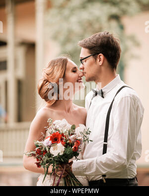 close up. portrait of happy bride and groom . Stock Photo