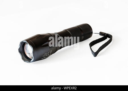 High-power black pocket torch isolated against a white background Stock Photo