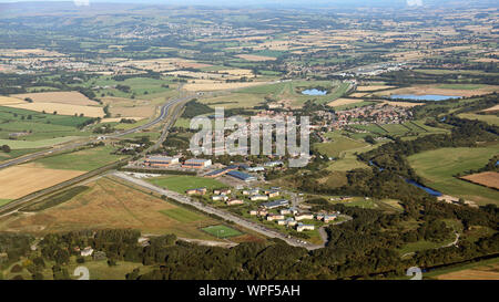 aerial view of Catterick village, Racecourse, former Airfield & Garrison in the distance, North Yorkshire, UK