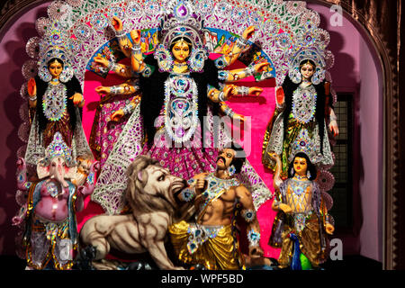 Durga puja background image. Sculpture of maa durga or maha kali or adi parashakti or bhabani taken at a barowari home based pooja occassion in west b Stock Photo