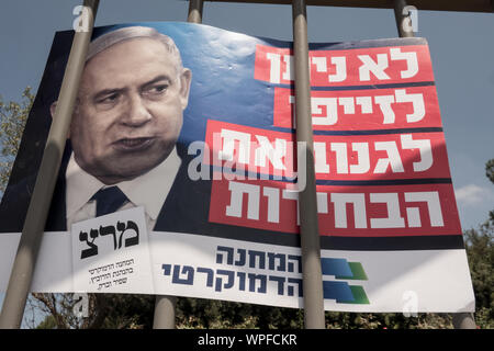 Jerusalem, Israel. 9th September, 2019. A sign depicting PM Netanyahu reads in Hebrew “We won't allow the forger to steal the elections” as Democratic Union activists protest against PM Netanyahu citing criminal suspicions, immoral campaigning and a blitz attempt to legislate the allowance of cameras inside election ballot booths. An assortment of political parties demonstrated in front of the Israeli Parliament building with similar messages ahead of round two of the national elections for parliament scheduled for 17th September, 2019. Credit: Nir Alon/Alamy Live News. Stock Photo
