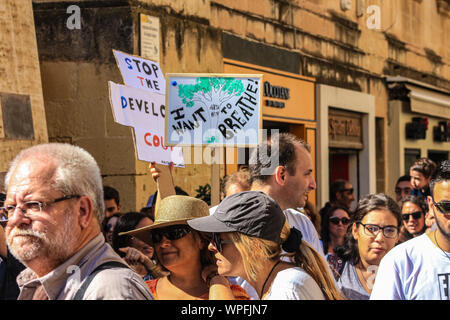 Enough is enough. A demonstration against environmental destruction in Malta. Protesting at out of control construction, road building. Stock Photo