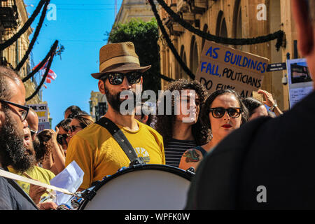 Enough is enough. A demonstration against environmental destruction in Malta. Protesting at out of control construction, road building. Stock Photo