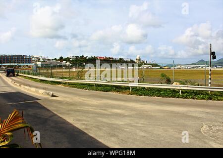 View of the runway at SXM Princess Juliana International Airport, taken from the Sunset Beach Bar diner, on Maho beach which is directly behind SXM. Stock Photo