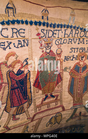 Victorian replica of the Bayeux tapestry housed in Reading Museum, Berkshire. UK. This scene shows King Harold at his Westminster Abbey coronation, after the death of King Edward the confessor in 1066. (113) Stock Photo