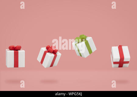 christmas gift boxes is flying on pink backdrop, Minimal composition. Stock Photo