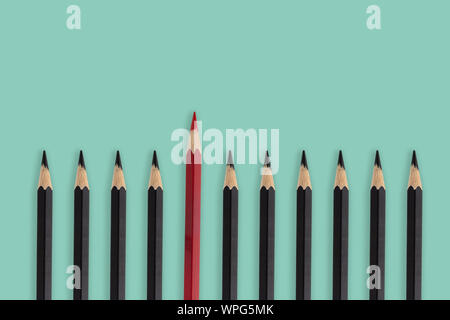 Top view black and red pencil on blue  colors background. idea minimal concept. Stock Photo