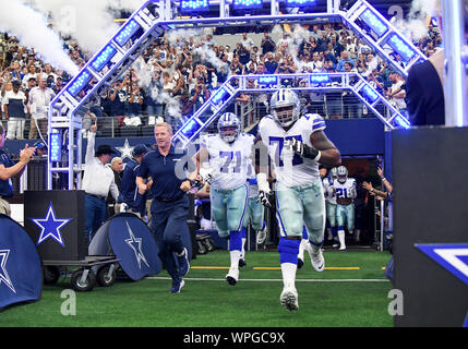 Sep 08, 2019: Dallas Cowboys head coach Jason Garrett enters the field with Dallas Cowboys offensive tackle La'el Collins #71 and Dallas Cowboys offensive tackle Tyron Smith #77 before an NFL game between the New York Giants and the Dallas Cowboys at AT&T Stadium in Arlington, TX Dallas defeated New York 35-17 Albert Pena/CSM Stock Photo