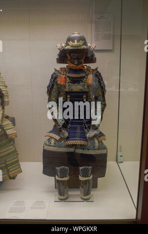 Suit of Armour in Haramaki Style | Japan | iron, gilded metal, stencilled leather and silk, with black lacquering | ca. 1850 (assembled) Stock Photo