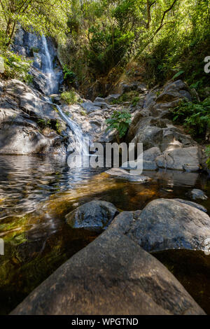 Serra do Espinhal, Portugal - August 31, 2019 : Waterfall Pedra Ferida, Coimbra, Portugal Stock Photo