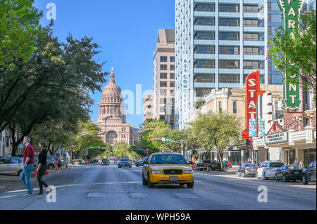 Traffic on Congress Avenue with Texas Capitol in the background. Austin is the capital city of Texas. Stock Photo