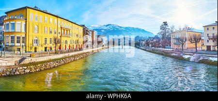 BAD ISCHL, AUSTRIA - FEBRUARY 23, 2019: The Traun river's banks are occupied with old edifices, villas and hotels in classical or modern style, on Feb Stock Photo