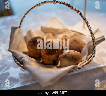 Selection of bread in a decorative basket Stock Photo