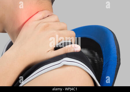 Young woman suffering from pain in neck Healthcare And Medicine concept. Stock Photo