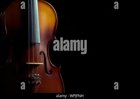 Close up violin on black background Stock Photo