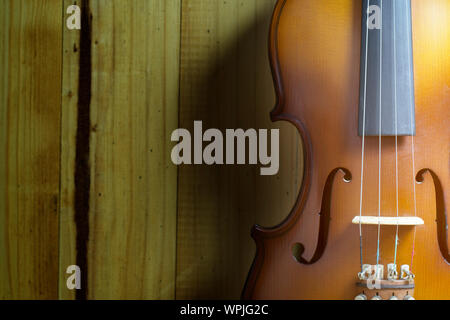 Close up violin on wood background Stock Photo