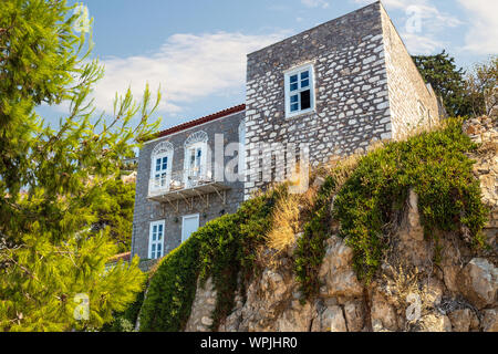 Narrow traditional white street in the town of Hydra, Hydra island, Greece Stock Photo