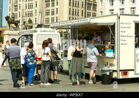 queuing for Hot food, , snacks at liverpool seafront. England UK.  , traditional food, hot, toast, meal, bread, delicious, cooked, lunch, fresh, healt Stock Photo