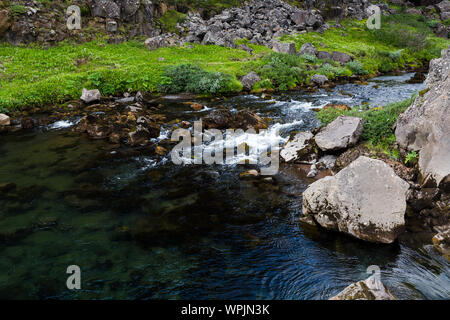 Drekkingarhylur, or drowning pool, former site of Viking capital punishment at Þingvellir, site of the first Iceland parliament Stock Photo