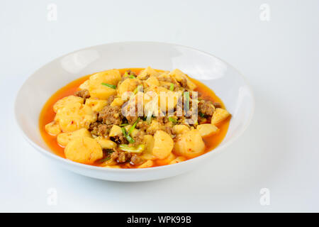 Mapo Tofu, popular Chinese dish.  The classic recipe consists of silken tofu, ground pork or beef and Sichuan peppercorn to name a few main ingredient Stock Photo
