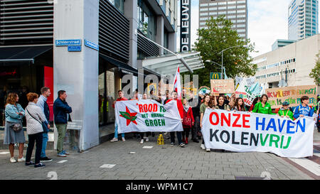 Rotterdam, Netherlands. 08th Sep, 2019. Protesters hold banners and placards during the demonstration.During the famous world harbour days of Rotterdam, a Climate demonstration was organized by several organizations to demand that the harbour takes its responsibility for the climate crisis. According to the organizations involved in the march, the harbour of Rotterdam is responsible for 1/5th of the total CO2 emissions in the Netherlands. There was a strong police presence where the demonstration was passing by close to the Harbour Festival. Credit: SOPA Images Limited/Ģ����ý Live News Stock Photo