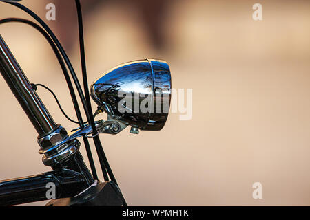 shiny polished lamp on an old, well-kept bicycle Stock Photo