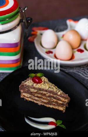 Delicious Portuguese Bolo Sans Rival cake sliced and served Stock Photo