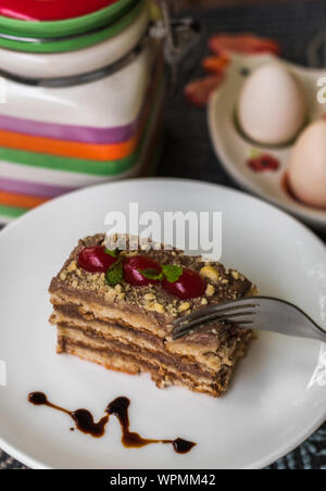 Delicious Portuguese Bolo Sans Rival cake sliced and served Stock Photo