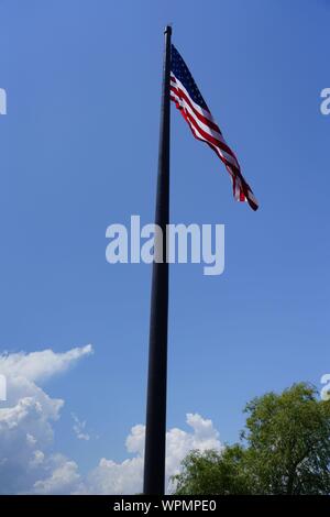 Close up Acuity Insurance Flagpole in Sheboygan Wisconsin is the world’s largest free-flying American flag in North America. Standing 400 feet tall. Stock Photo