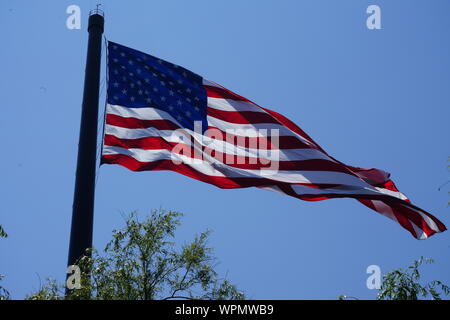 Close up Acuity Insurance Flagpole in Sheboygan Wisconsin is the world’s largest free-flying American flag in North America. Standing 400 feet tall. Stock Photo