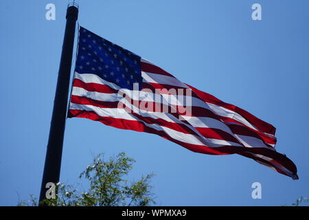 Close up Acuity Insurance Flagpole in Sheboygan Wisconsin is the world’s largest free-flying American flag in North America. Standing 400 feet tall. Stock Photo