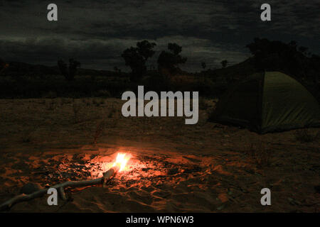 Camping with a nice Campfire next to Alice Springs, Northern Territory, Australia, night time shot Stock Photo