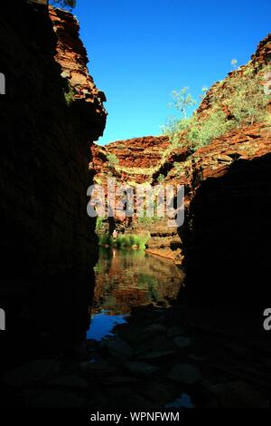 Hiking and swimming in Karijini National-Park, Western Australia with beautiful rock formations Stock Photo