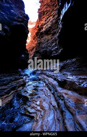 Hiking and swimming in Karijini National-Park, Western Australia with beautiful rock formations Stock Photo