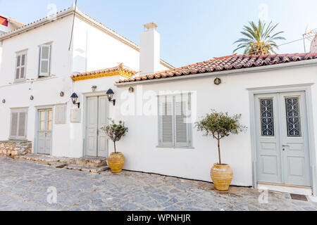 Narrow traditional white street in the town of Hydra, Hydra island, Greece Stock Photo