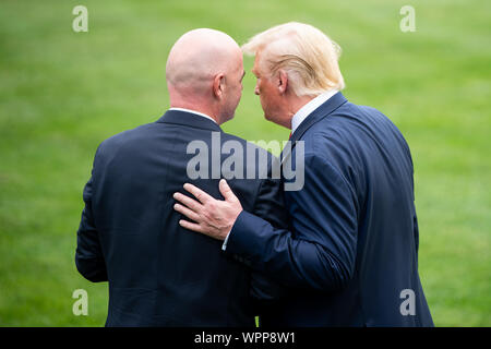 Washington DC, USA. 09th Sep, 2019. President Donald Trump (R) talks to FIFA President Gianni Infantino as Trump departs the White House for a rally in North Carolina, in Washington, DC on Monday, September 9, 2019. Photo by Kevin Dietsch/UPI Credit: UPI/Alamy Live News Stock Photo