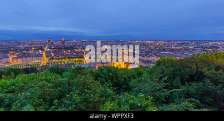 The Saint-Jean cathedral, Saone River and the city center, at evening, in Lyon, France Stock Photo