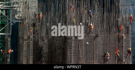 Construction workers on a building site in Mexico City Stock Photo