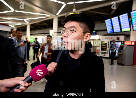 Berlin, Germany. 09th Sep, 2019. Joshua Wong, democracy activist of the protests in Hong Kong, arrives in Berlin at Tegel Airport. Credit: Christoph Soeder/dpa/Alamy Live News Stock Photo