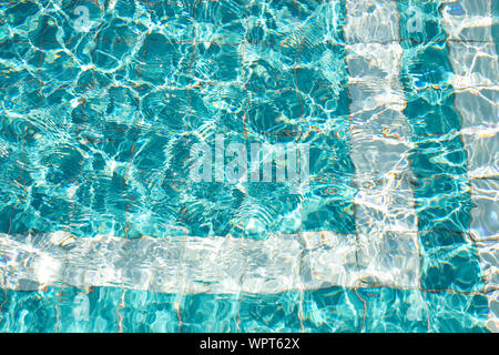 A view of crystal clear swimming pool water, as a background. Stock Photo